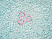 Funboy Clear Pink Heart Tubes Floating in Tropical Water
